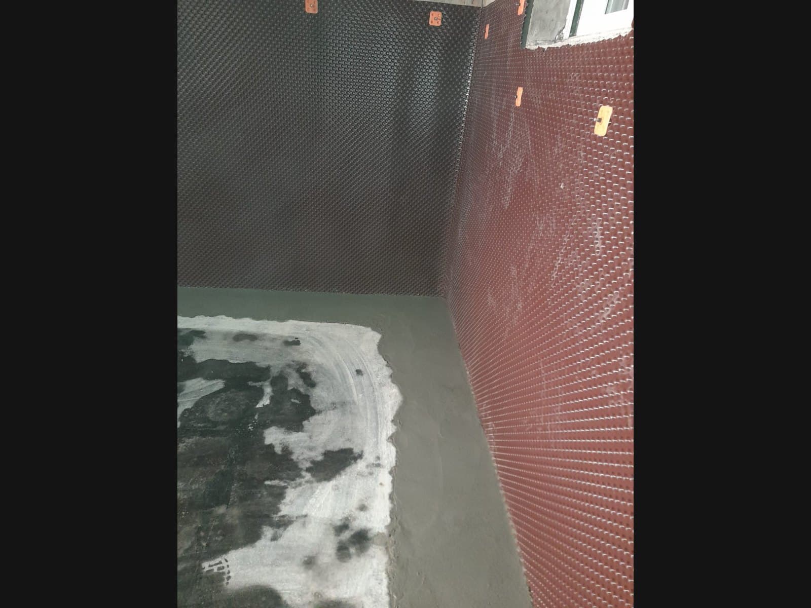 Standing water in a drainage pipe — a late-stage Wasaga waterproofing problem
