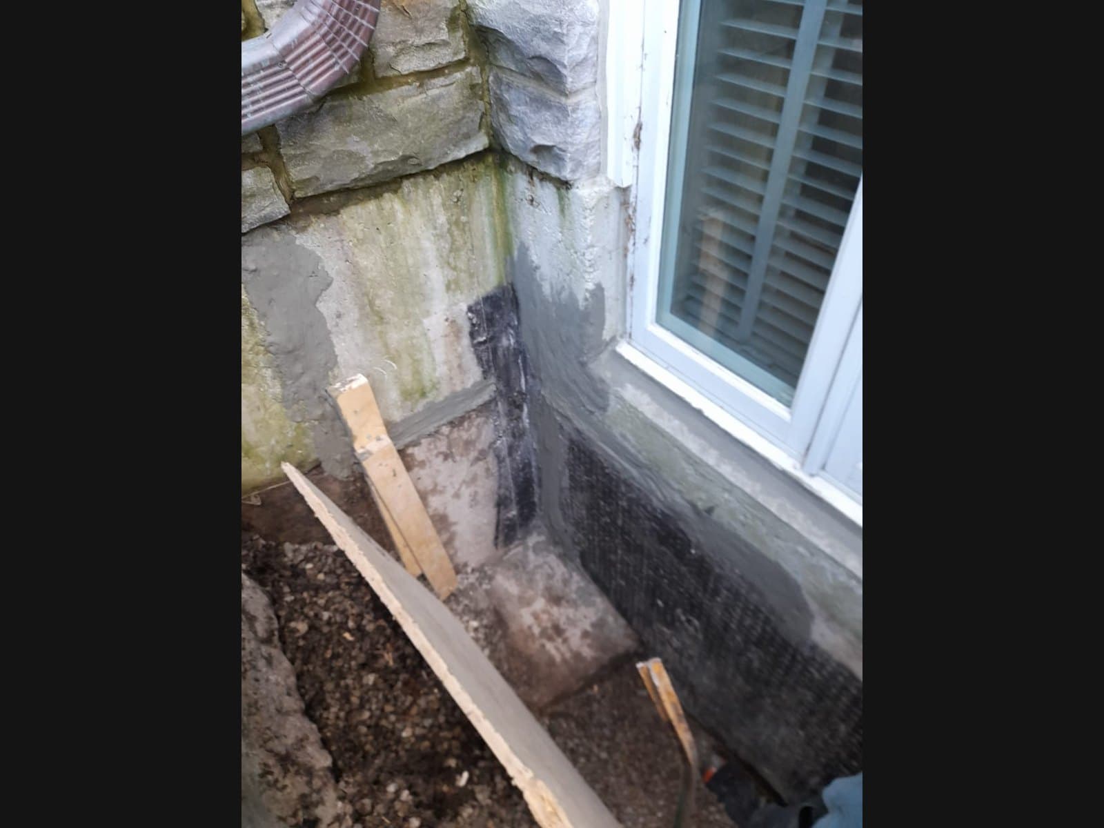 Foundation excavation on a Wasaga-area waterproofing job