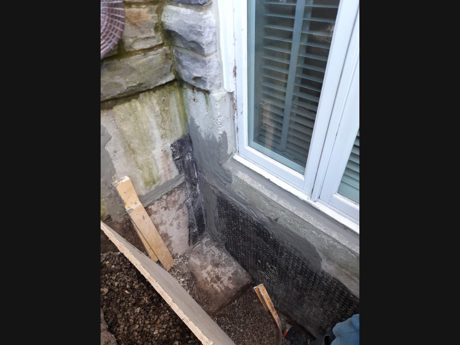 Exterior foundation membrane and drainage trench in Wasaga Beach