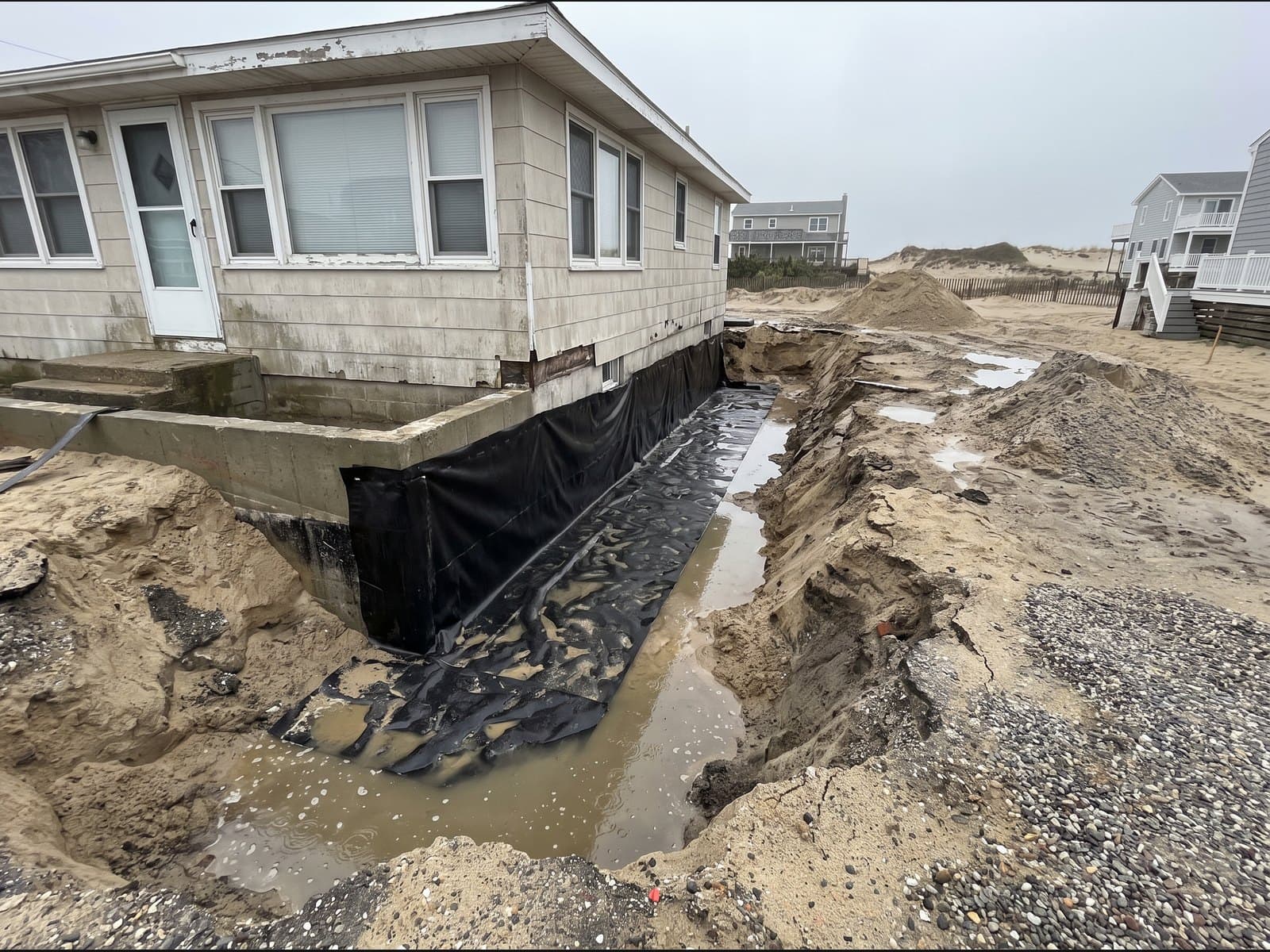 Exterior waterproofing excavation at a Wasaga Beach home