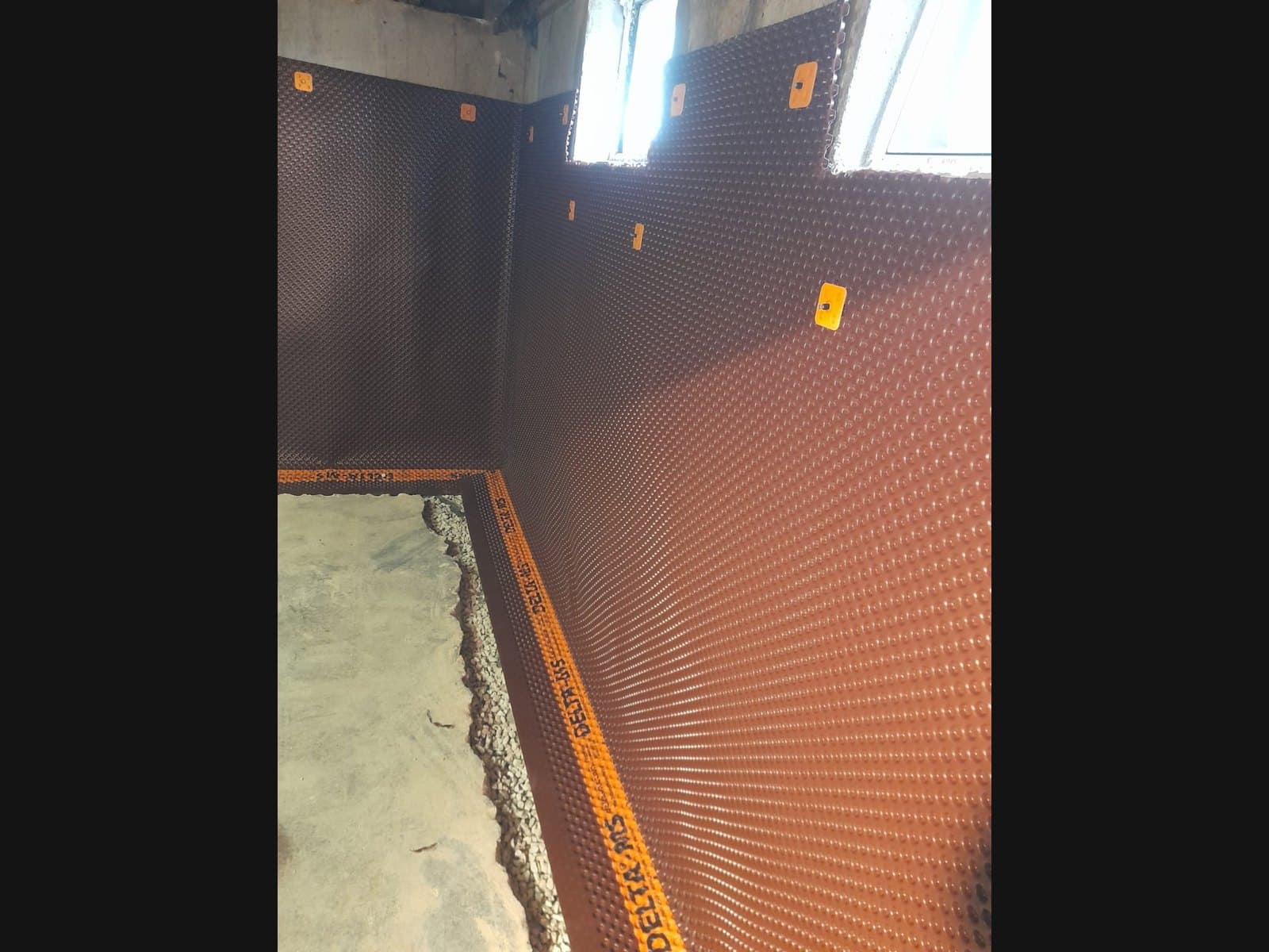 Interior perimeter drain inspection in a Wasaga Beach basement